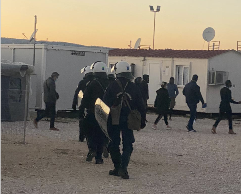 Riot Police in the forced evictions on 14 December in the refugee camp of Katsikas in Greece.  